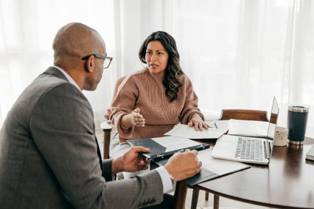 Teacher meeting mortgage broker for first home buyer support and loan incentives Teacher meeting mortgage broker for first home buyer support and loan incentives