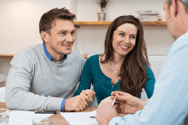 Australian homeowners consulting mortgage broker about investment property occupancy change Australian homeowners consulting mortgage broker about investment property occupancy change